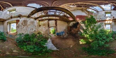 360 hdri panorama inside abandoned ruined bushy concrete decaying old building without roof in full seamless spherical hdri panorama in equirectangular projection, AR VR virtual reality content photo