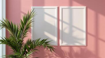 Two vertical white frame mockups on pink wall and large plant next to it. photo