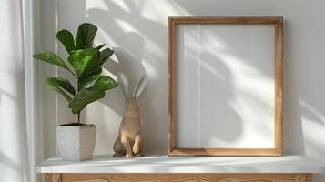 Mockup of wood border thin frame with rabbit sculpture next to it. photo