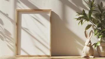 Mockup of wood border thin frame with rabbit sculpture next to it. photo