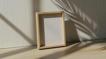 A wooden picture frame for photos, in the style of Japanese minimalism. photo