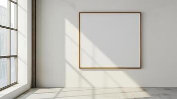 A thin gold frame on a white wall. photo