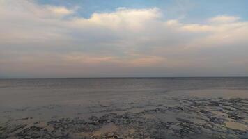 the calm atmosphere enjoys the open sea view on the beach photo