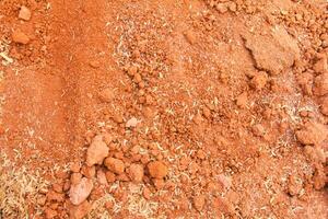 Red clay used as a handicraft material, clay background photo