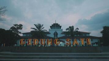Gedung Sate building at dusk with illuminated letters video