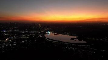 Curitiba in Parana, Brazil. Aerial View. Wonderful sunset with views of buildings and Tangua Park. Lake with reflection. video