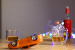 Alcoholic drinks were in goblets and placed on tables within party. Alcohol was consumed by drinkers within party before departed. drinking alcohol in moderation and campaigning against drunk driving. photo