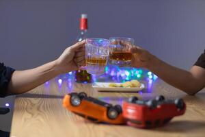 Alcoholic drinks were in goblets and placed on tables within party. Alcohol was consumed by drinkers within party before departed. drinking alcohol in moderation and campaigning against drunk driving. photo