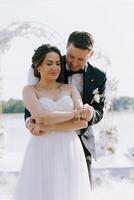 the first dance of the bride and groom inside a restaurant photo