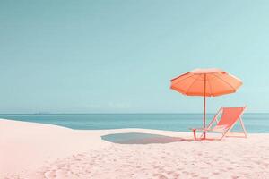 Pink beach umbrella and chair photo