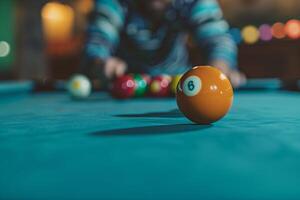 Coloured billiard balls with man photo