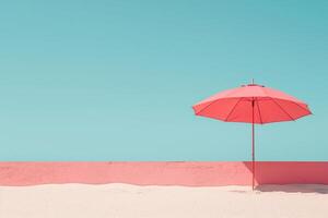 Single pink umbrella on pink sand photo