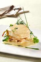 pirarucu fillet in bechamel sauce with hearts of palm photo