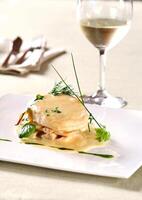 pirarucu fillet in bechamel sauce with hearts of palm photo