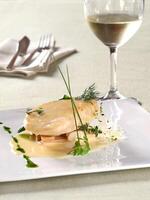 pirarucu fillet in bechamel sauce with hearts of palm photo