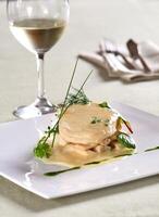 pirarucu fillet in bechamel sauce with hearts of palm photo