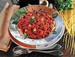 spaghetti with tomato and basil sauce photo