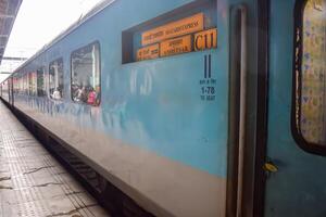 Delhi, India, June 09 2024 - Indian railway express train at departure from Anand Vihar railway station during morning time, Colourful Express train at Delhi railway station photo