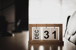 December calendar page. 31st day of New Year's Eve in the office room. with copy space and business design Planning concepts, setting new strategic goals photo