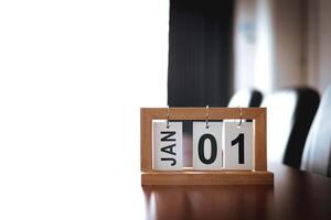January calendar page. 1st day of new year in conference room in office. with copy space and business design, Concept for planning and setting new strategic goals photo