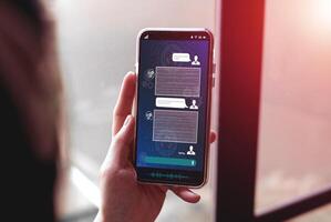 Data search, artificial intelligence chatbot, and data collection with global technology network. women chat with chatbots on smartphones to find business information. photo