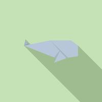 Blue origami whale casting a shadow on green background vector