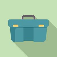 Blue plastic toolbox with metal locks is closed and lying on green surface vector