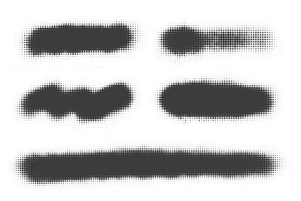 Halftone dotted shapes on white background. Paint blob with noisy effect. Abstract splatter stroke shapes.