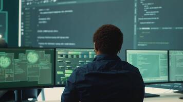 Governmental hackers analyzing big data for cyber threat detection, working at agency desks. Professional expert woman analyzes cyber intelligence and prevention of digital threats. Camera A. video