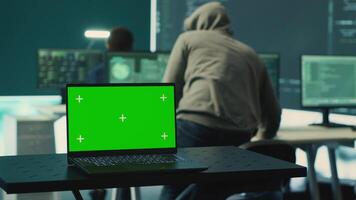 Isolated copy space running on a laptop in high tech agency office, governmental hackers analyzing digital threats on big screens. Working on cybercrime and protection against phishing. Camera A. video