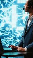 Vertical Speaker talking with audience during remote call online AI webinar hosting leading experts and researchers exploring latest insights in artificial intelligence technology, camera A video