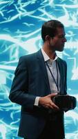 Vertical Engineers use VR smart goggles and AI neural networks to solve company problems. IT experts using artificial intelligence and AR virtual reality tech to visualize startup business data, camera A video