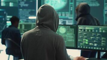 Cyber security specialist conducting cyber surveillance and threat detection in a governmental agency. Professional hackers team managing cybercrime prevention and malware detection. Camera A. video