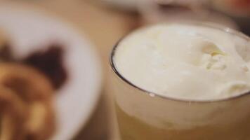 Beer. Glass of fresh and cold beer on a wooden table. Craft beer. Shallow depth of field. Copy space. video