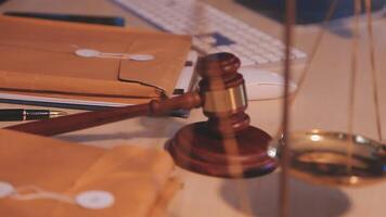 Judge gavel with Justice lawyers having team meeting at law firm background. Concepts of Law and Legal services. video