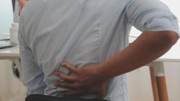 Orthopedists holding digital tablet and pointing at model. Concept of osteoporosis, back pain, lumbar, chiropractic and health. video