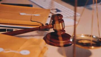 Judge gavel with Justice lawyers having team meeting at law firm background. Concepts of Law and Legal services. video