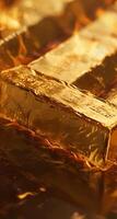 Gold bars and fire, reflecting hot gold price increase in market concept, on the rich golden reflect light background, Gold is hard commodity good, risk asset, tangible value photo