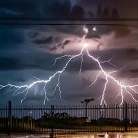 Lightning thunderstorm flash over the dark sky, Concept on topic weather, cataclysms, hurricane, Typhoon, tornado, storm multimedia content photo