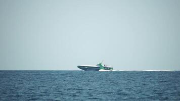 A high speed boat is sailing in the calm ocean. video