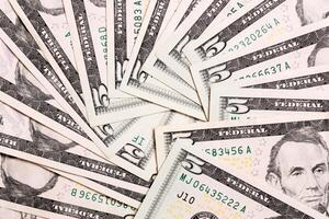 US Dollar bills. one hundred dollar bills background. Top view of business concept on background with copy space photo