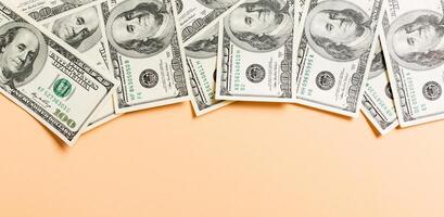 one hundred dollar bills Top view of business concept on background with copy space photo