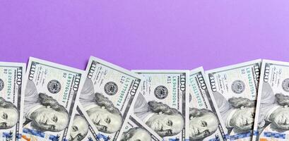 one hundred dollar bills Top view of business concept on background with copy space photo