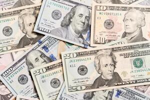 US Dollar bills. one hundred dollar bills background. Top view of business concept on background with copy space photo