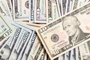 US Dollar bills. one hundred dollar bills background. Top view of business concept on background with copy space photo
