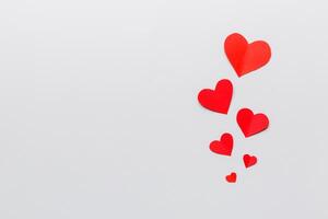 Valentine day background with red hearts, top view with copy space photo