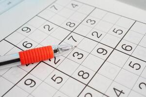 Sudoku puzzle, game to play for keep you brain younger for developing Alzheimer disease in senior patient. photo