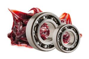 Grease isolated on white backgroud with clipping path, red excellent water resistance synthetic lithium complex grease for moving path and machinery lubrication. photo