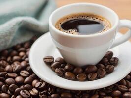 Coffee cup and coffee beans on table photo