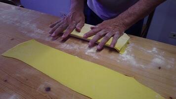 on the preparation of homemade ricotta and saffron ravioli, a traditional Italian dish. video